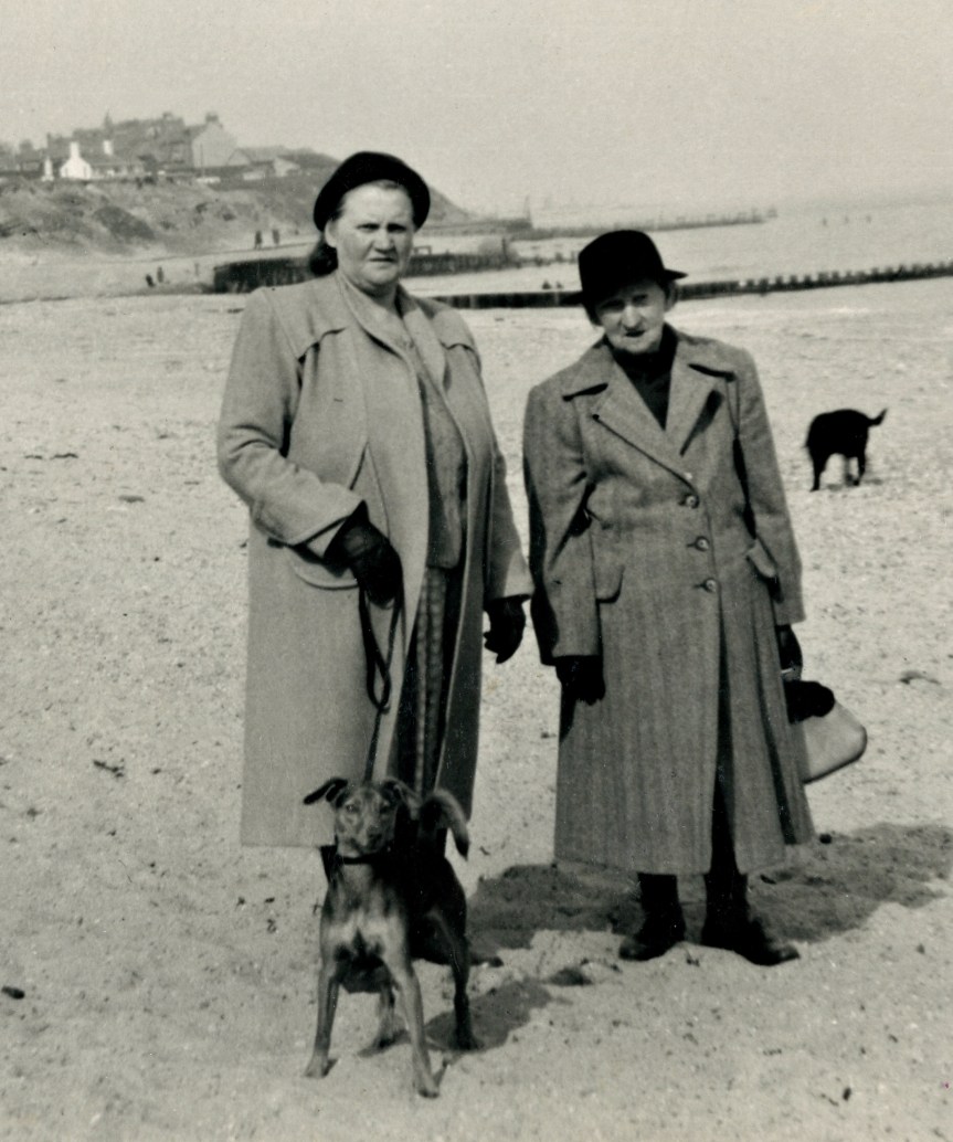 Miriam Fieldhouse with older woman and dog. Circa 1940  (F1-1)